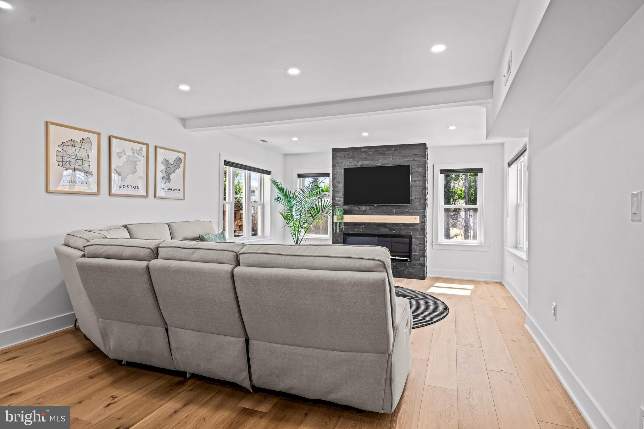1828 Prospect Ridge Boulevard Haddon Heights, NJ 08035 - Photo 22 of 57 a living room with furniture and a flat screen tv