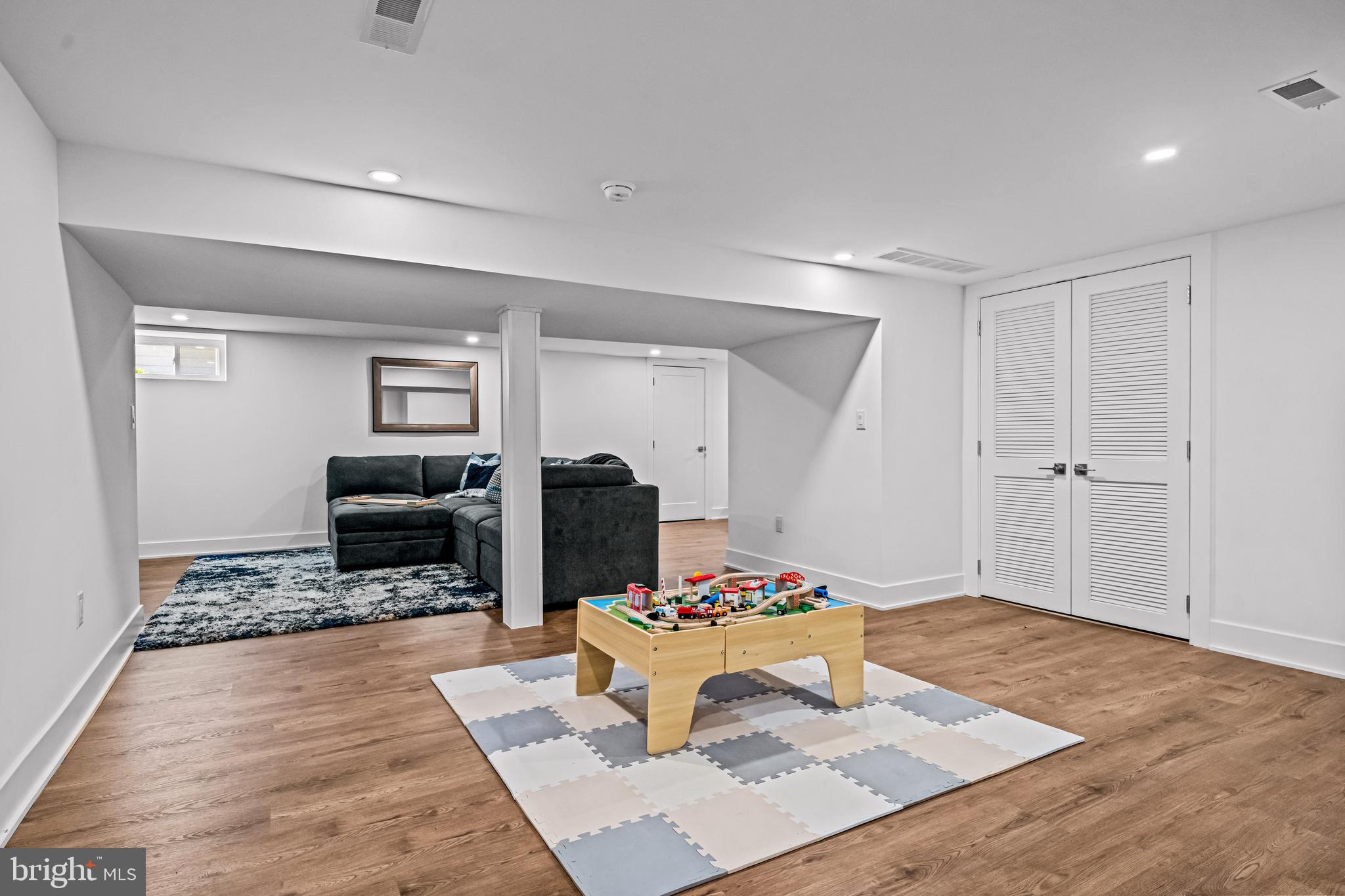 1828 Prospect Ridge Boulevard Haddon Heights, NJ 08035 - Photo 29 of 57 a living room with a fireplace and rug kitchen view