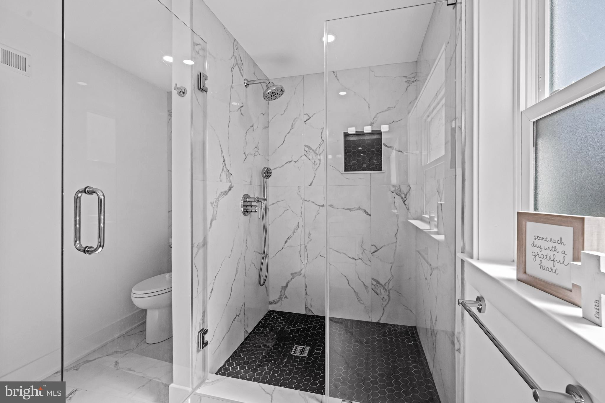 1828 Prospect Ridge Boulevard Haddon Heights, NJ 08035 - Photo 43 of 57 a bathroom with a sink a toilet and shower