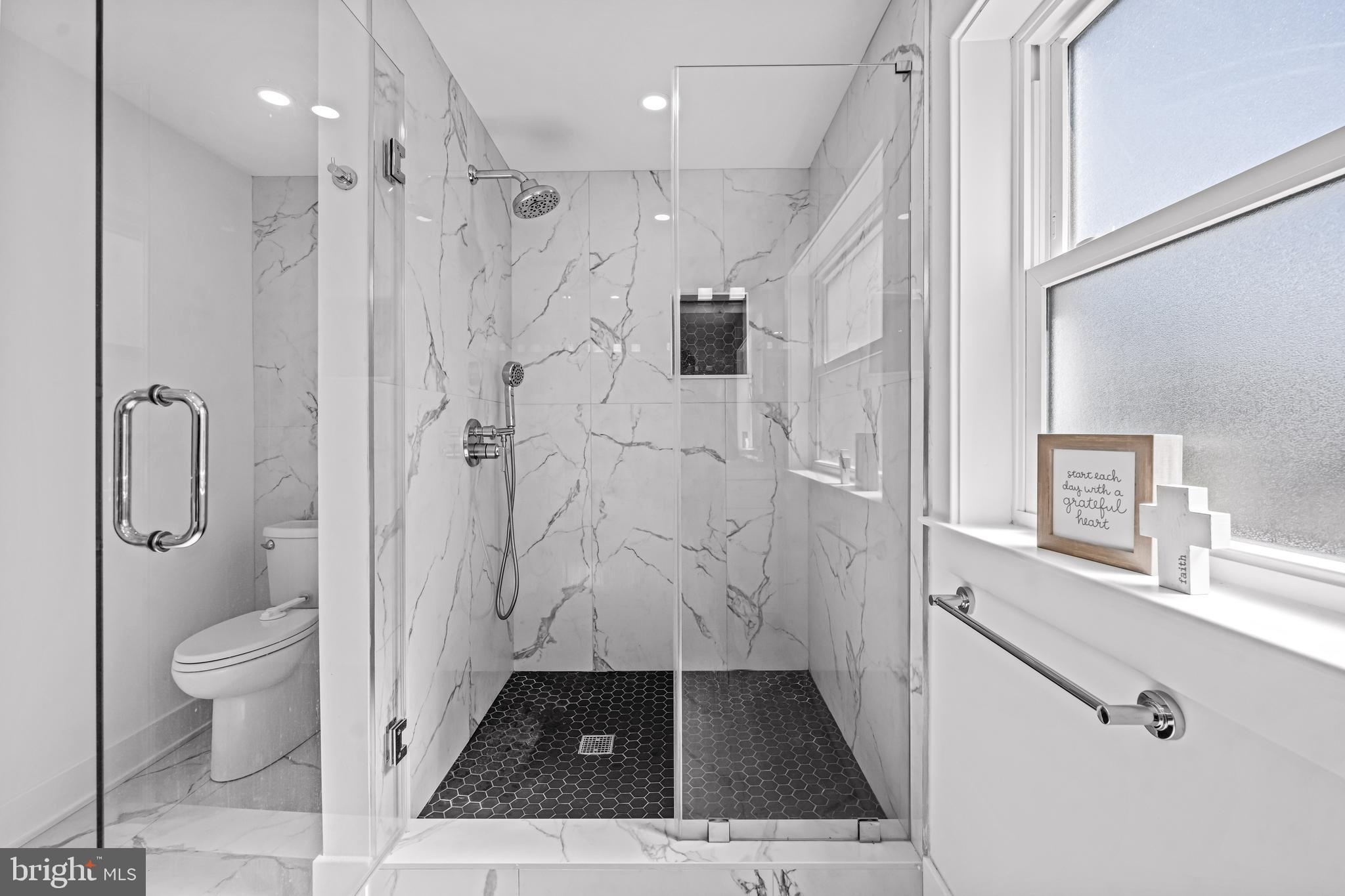 1828 Prospect Ridge Boulevard Haddon Heights, NJ 08035 - Photo 44 of 57 a bathroom with a sink a toilet and shower