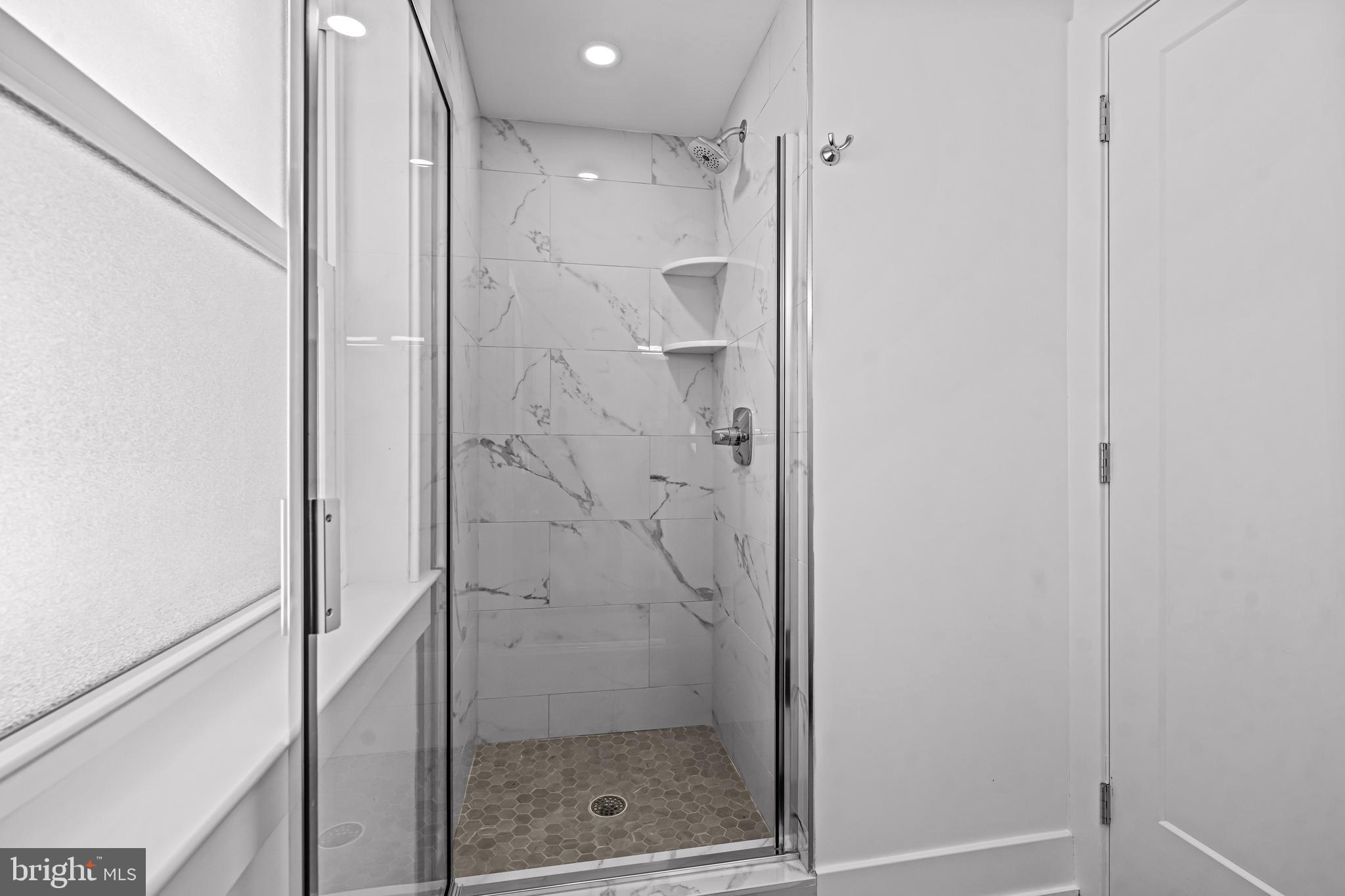 1828 Prospect Ridge Boulevard Haddon Heights, NJ 08035 - Photo 48 of 57 a bathroom with a glass shower door