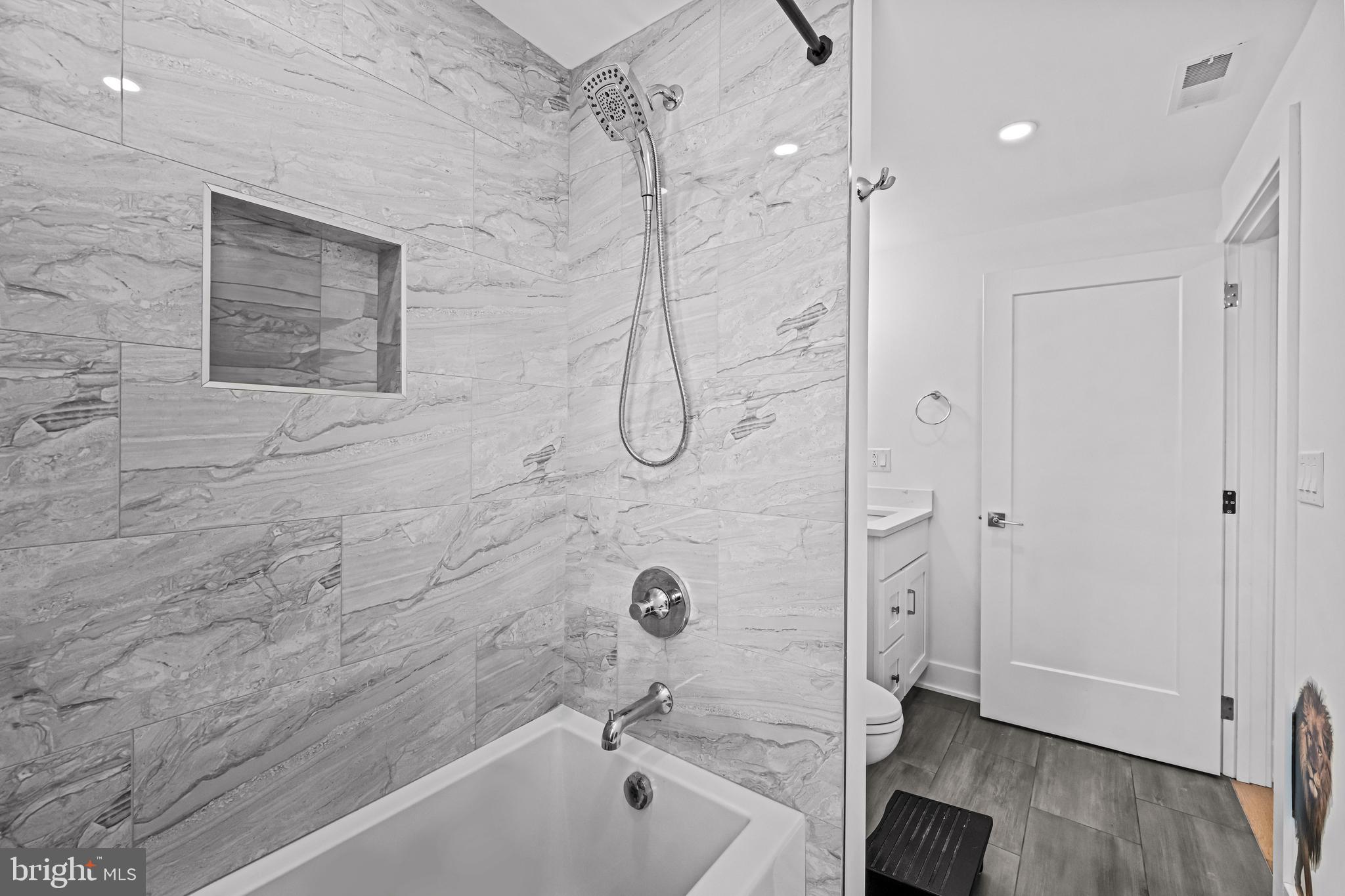1828 Prospect Ridge Boulevard Haddon Heights, NJ 08035 - Photo 51 of 57 a bathroom with a bathtub and a shower
