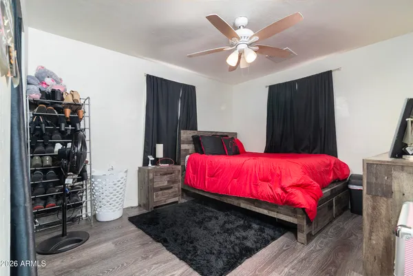 a bed room with a bed and a fish tank