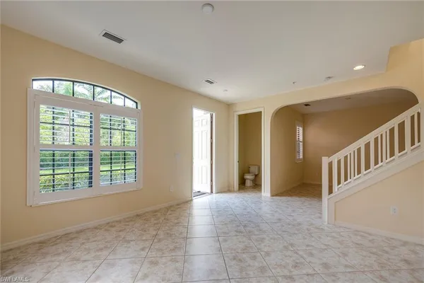 an empty room with windows