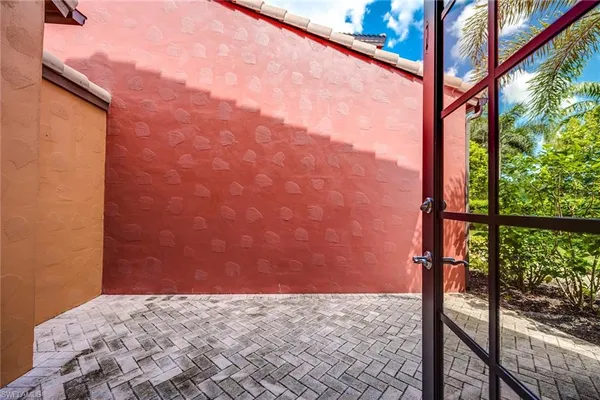 a view of front door and yard