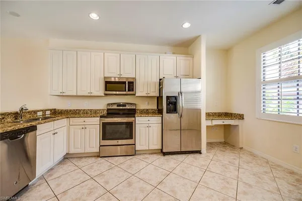 a view of a livingroom with a staircase