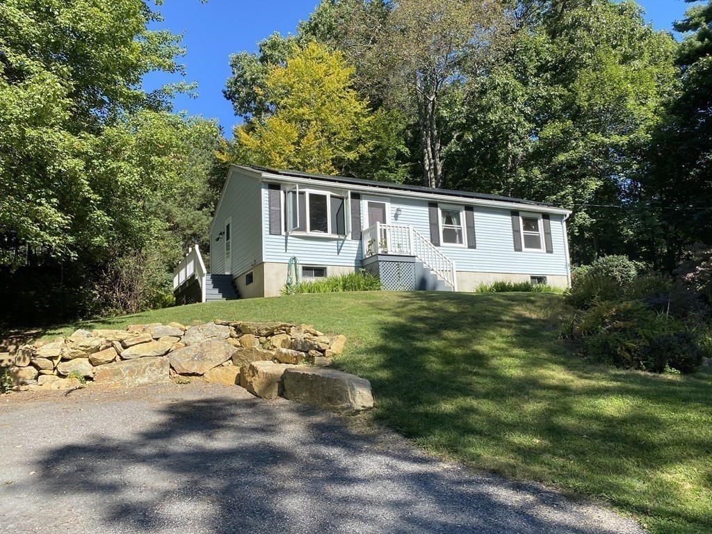 370 Nichols Road Barre, MA 01005 - Photo 21 of 25 a front view of a house with a yard