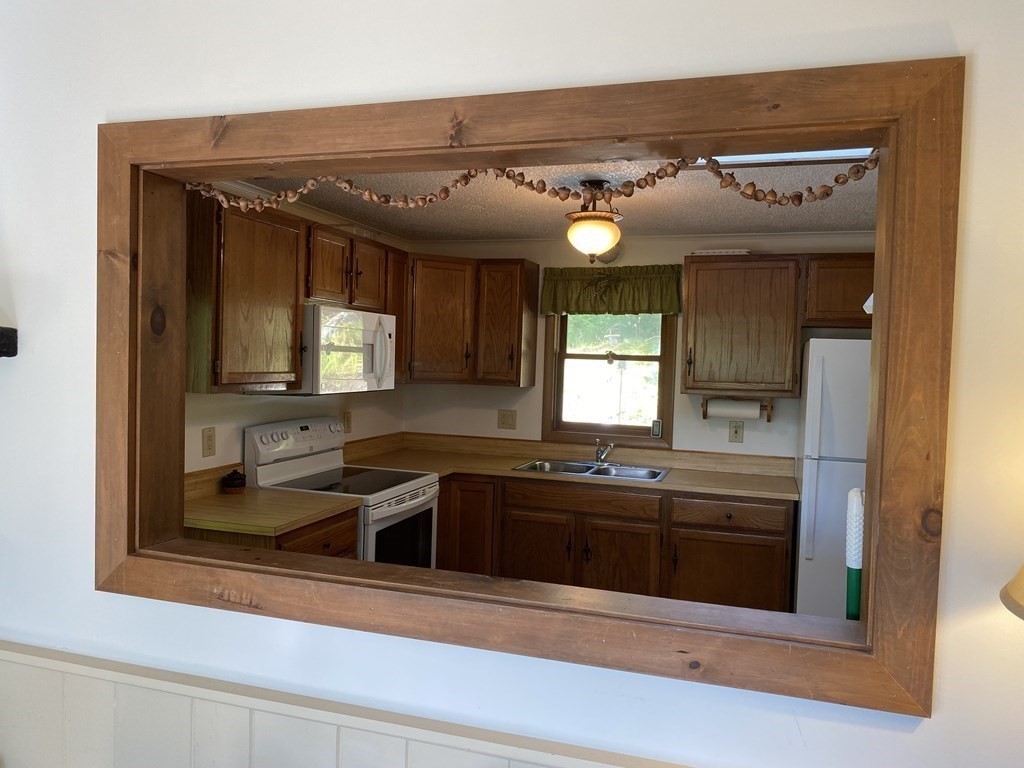 370 Nichols Road Barre, MA 01005 - Photo 8 of 25 a kitchen with a sink and a microwave