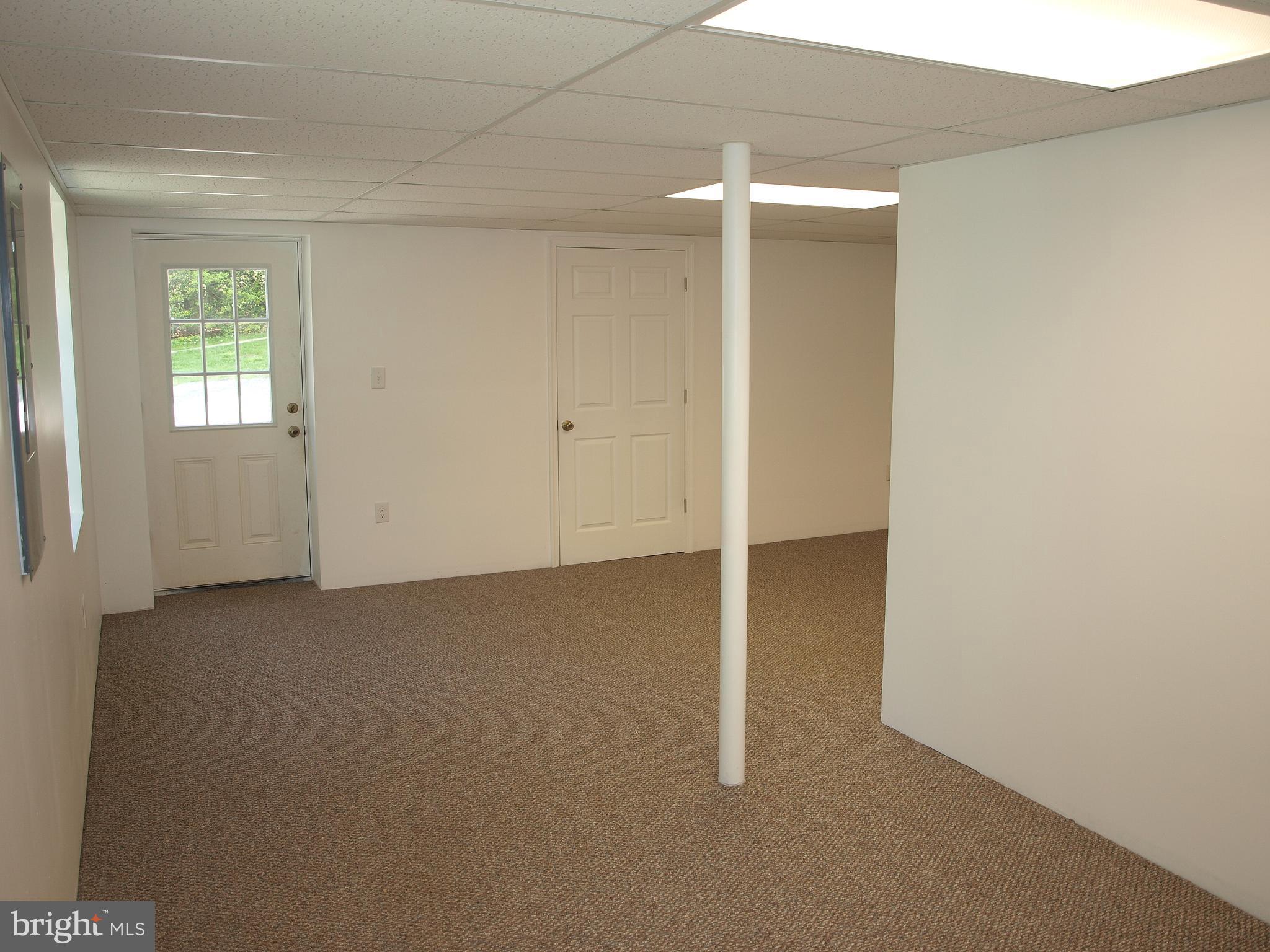 49 Pendyrus Street Delta, PA 17314 - Photo 44 of 52 NEWLY FINISHED WALK OUT BASEMENT