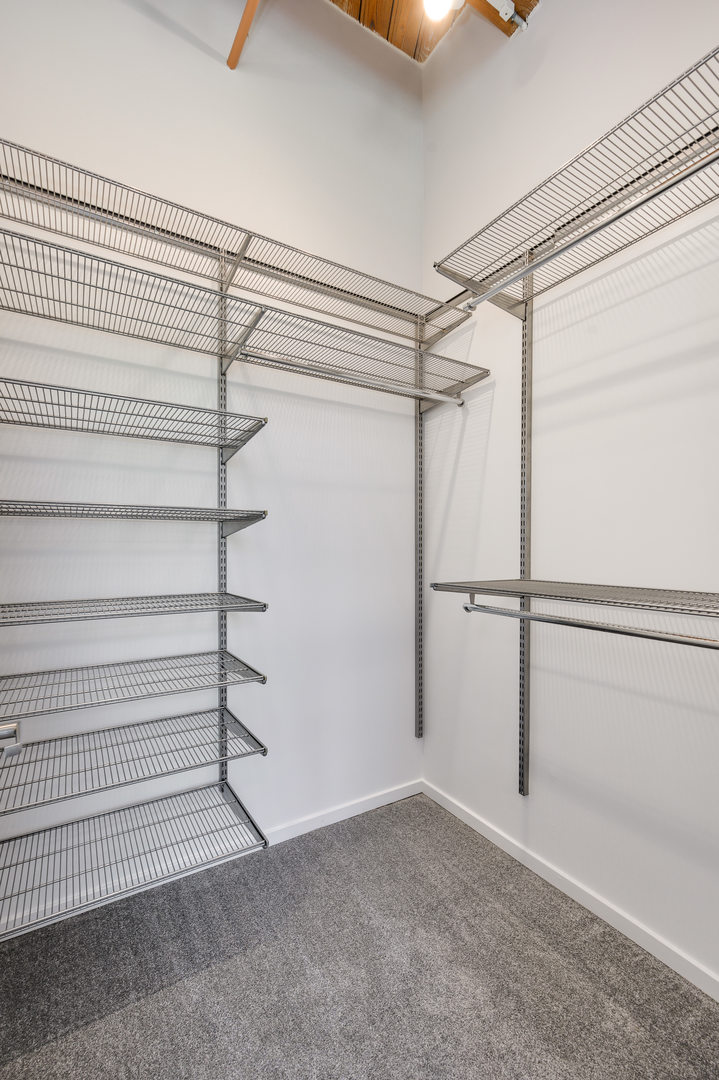 1040 West Adams Street, Unit 269 Chicago, IL 60607 - Photo 11 of 23 a view of an empty walk in closet