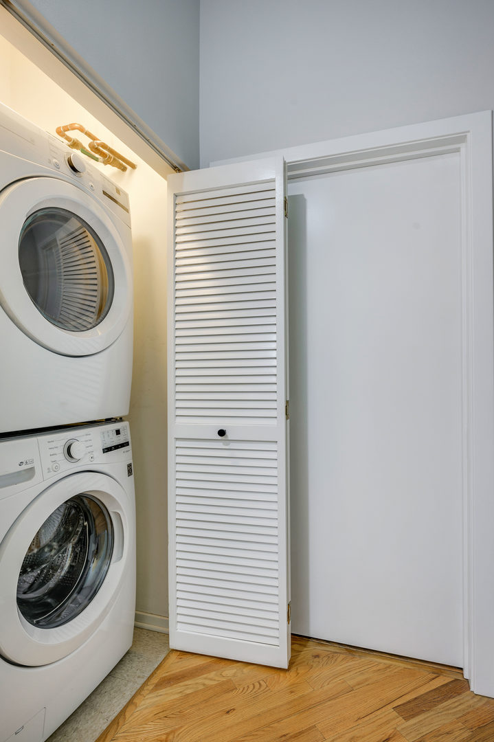 1040 West Adams Street, Unit 269 Chicago, IL 60607 - Photo 15 of 23 a view of a storage & utility room with washer and dryer