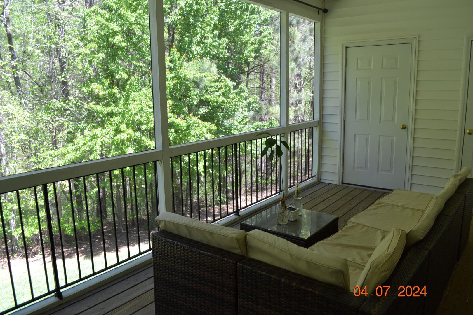 4506 Mistiflower Drive Raleigh, NC 27606 - Photo 11 of 27 a view of a two chairs in the balcony
