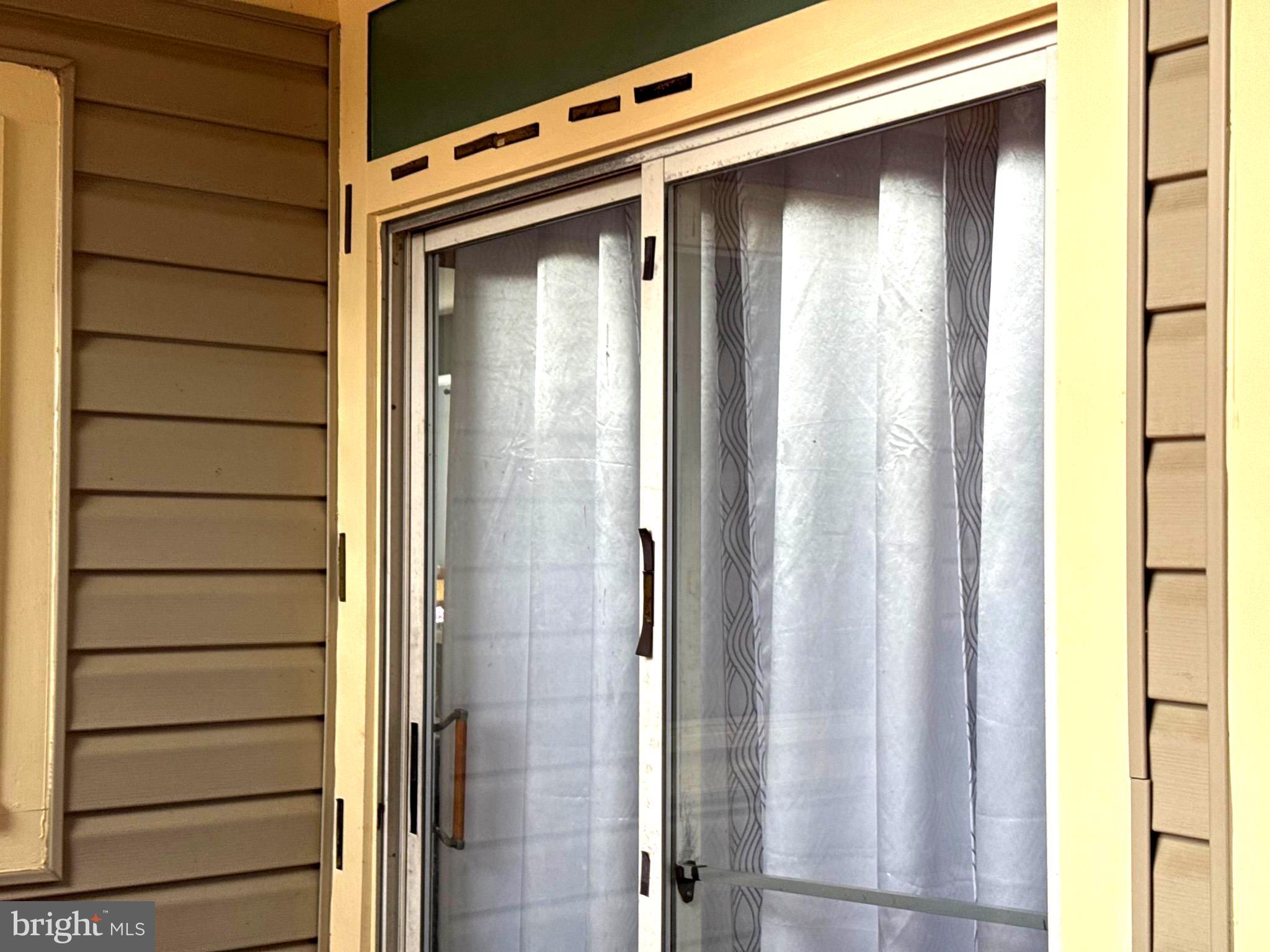9348 Creekview Drive Laurel, MD 20708 - Photo 48 of 58 SLIDING DOOR TO EXIT TO THE DECK