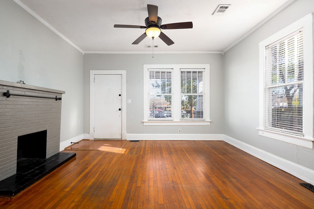1024 18th Street Columbus, GA 31901 - Photo 2 of 20 a view of room window and wooden floor
