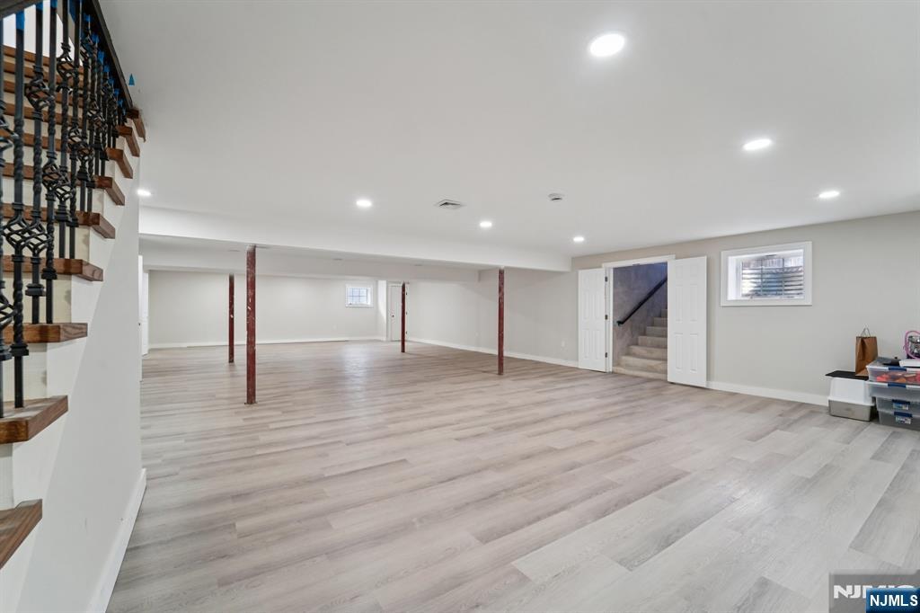 24 Holmes Lane Wayne, NJ 07470 - Photo 32 of 47 a view of empty room with wooden floor