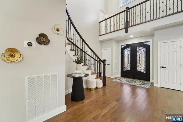 a view of entryway with wooden floor