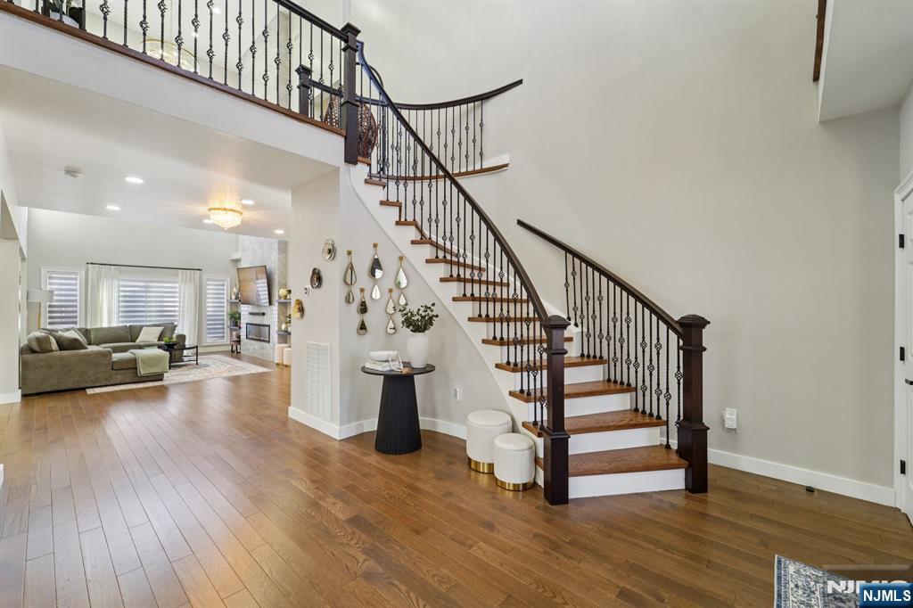 24 Holmes Lane Wayne, NJ 07470 - Photo 6 of 47 a view of entryway and hall with wooden floor