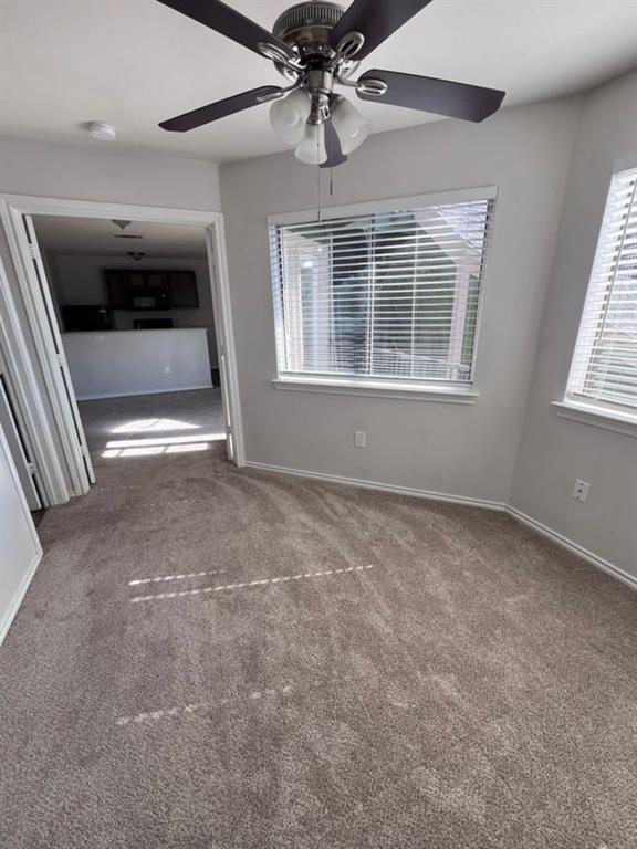 9837 Walnut Street, Unit 305 Dallas, TX 75243 - Photo 9 of 10 a view of empty room with windows