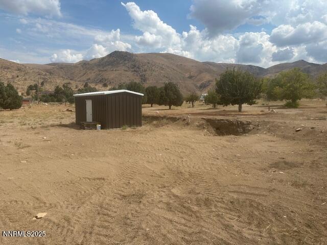 38 Burcham Flat Road Coleville, CA 96107 - Photo 22 of 39 a view of a dry yard with mountains and mountain view