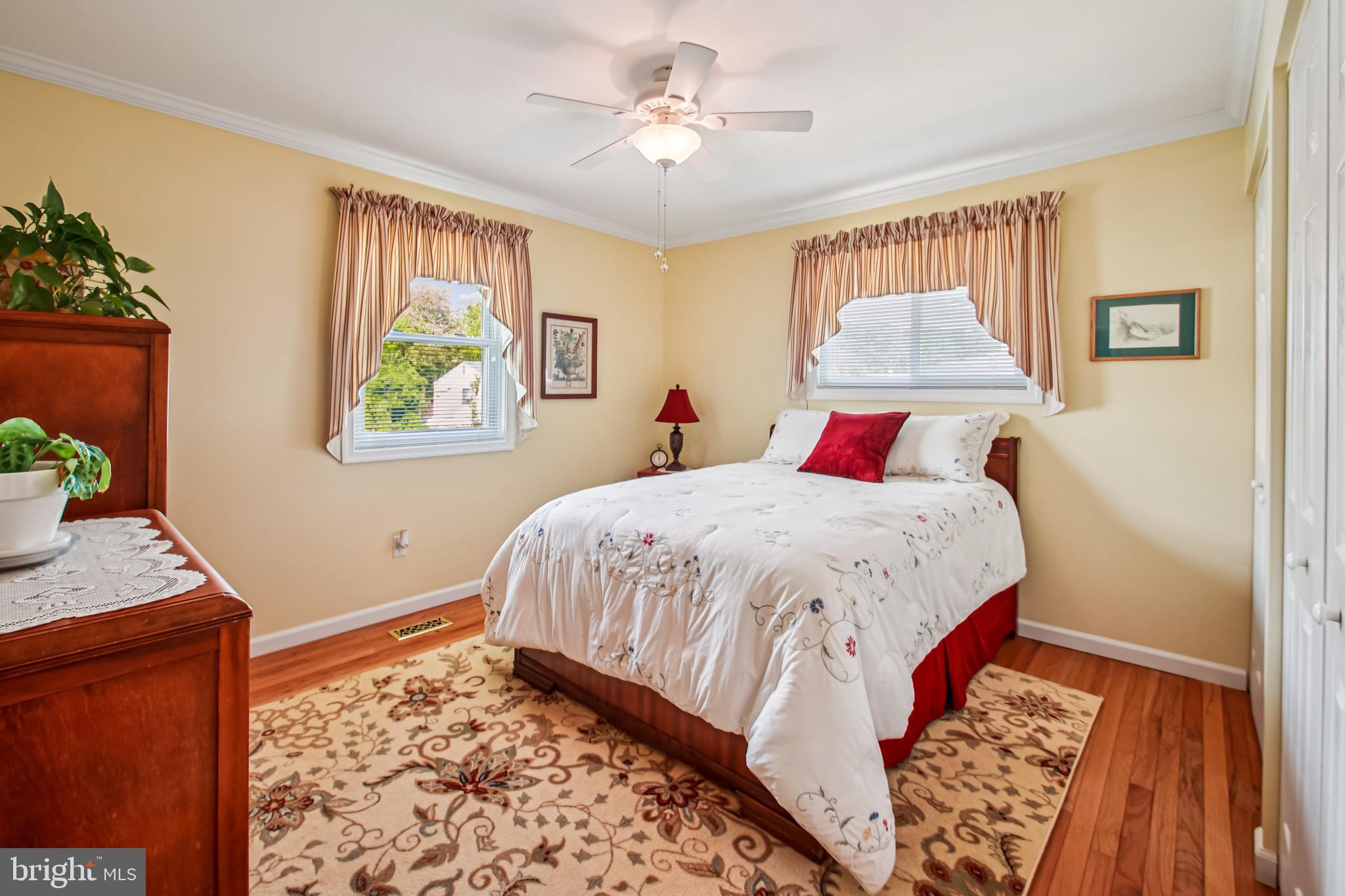 8113 Callo Lane Rosedale, MD 21237 - Photo 20 of 32 a bedroom with a bed and a window