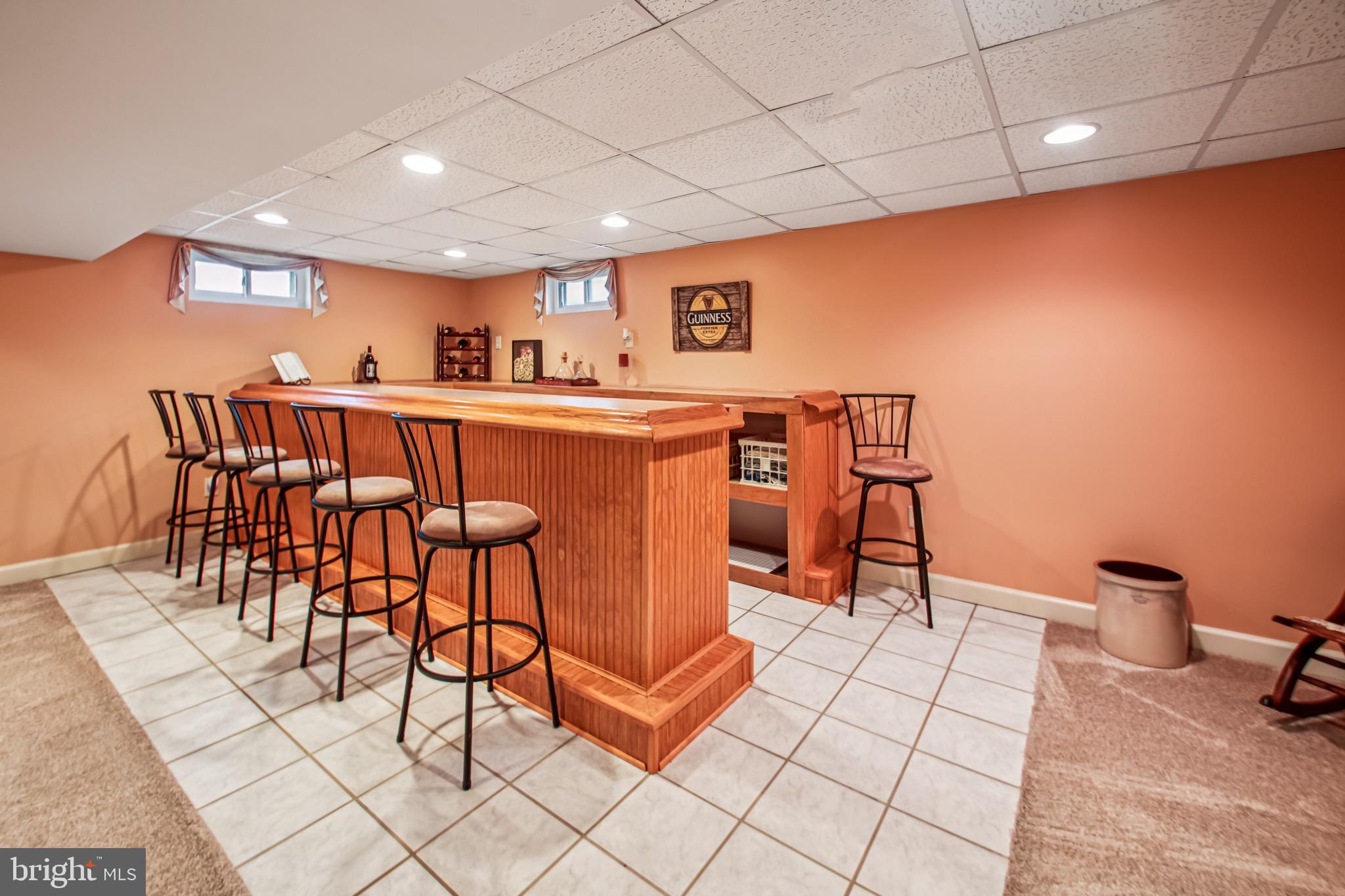 8113 Callo Lane Rosedale, MD 21237 - Photo 29 of 32 a view of a dining room with furniture and a rug