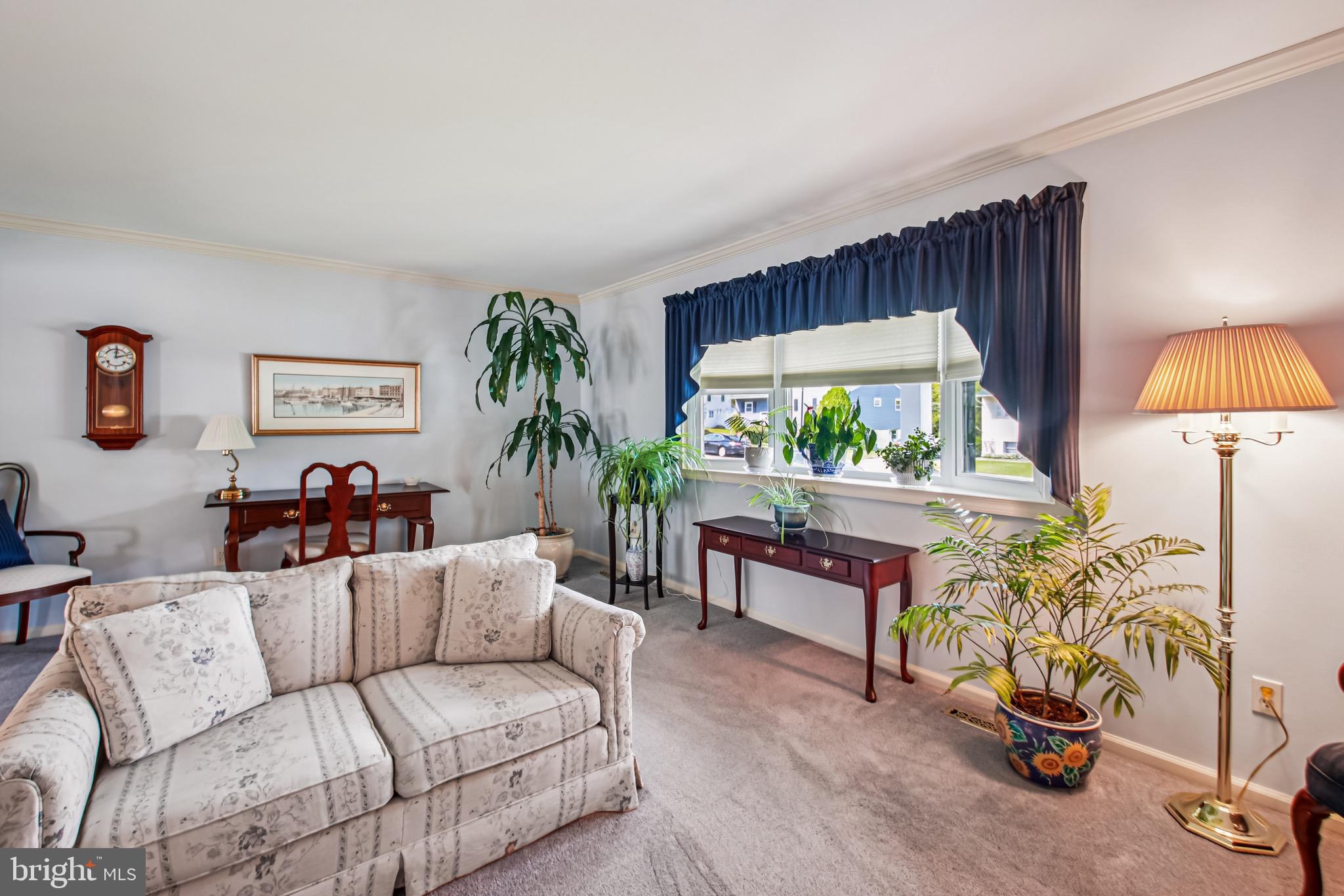 8113 Callo Lane Rosedale, MD 21237 - Photo 3 of 32 a living room with furniture and a large window