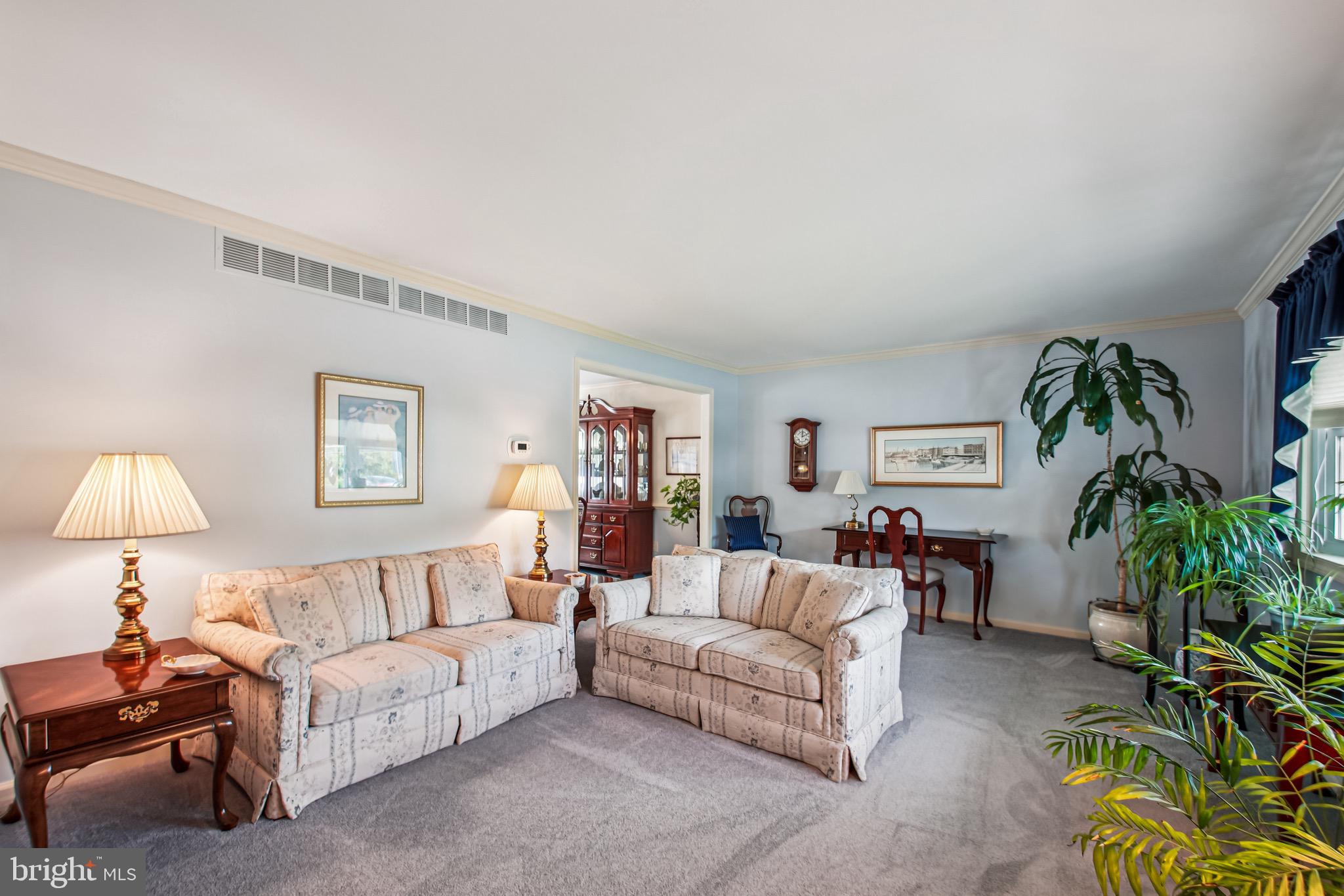 8113 Callo Lane Rosedale, MD 21237 - Photo 4 of 32 a living room with furniture and a potted plant