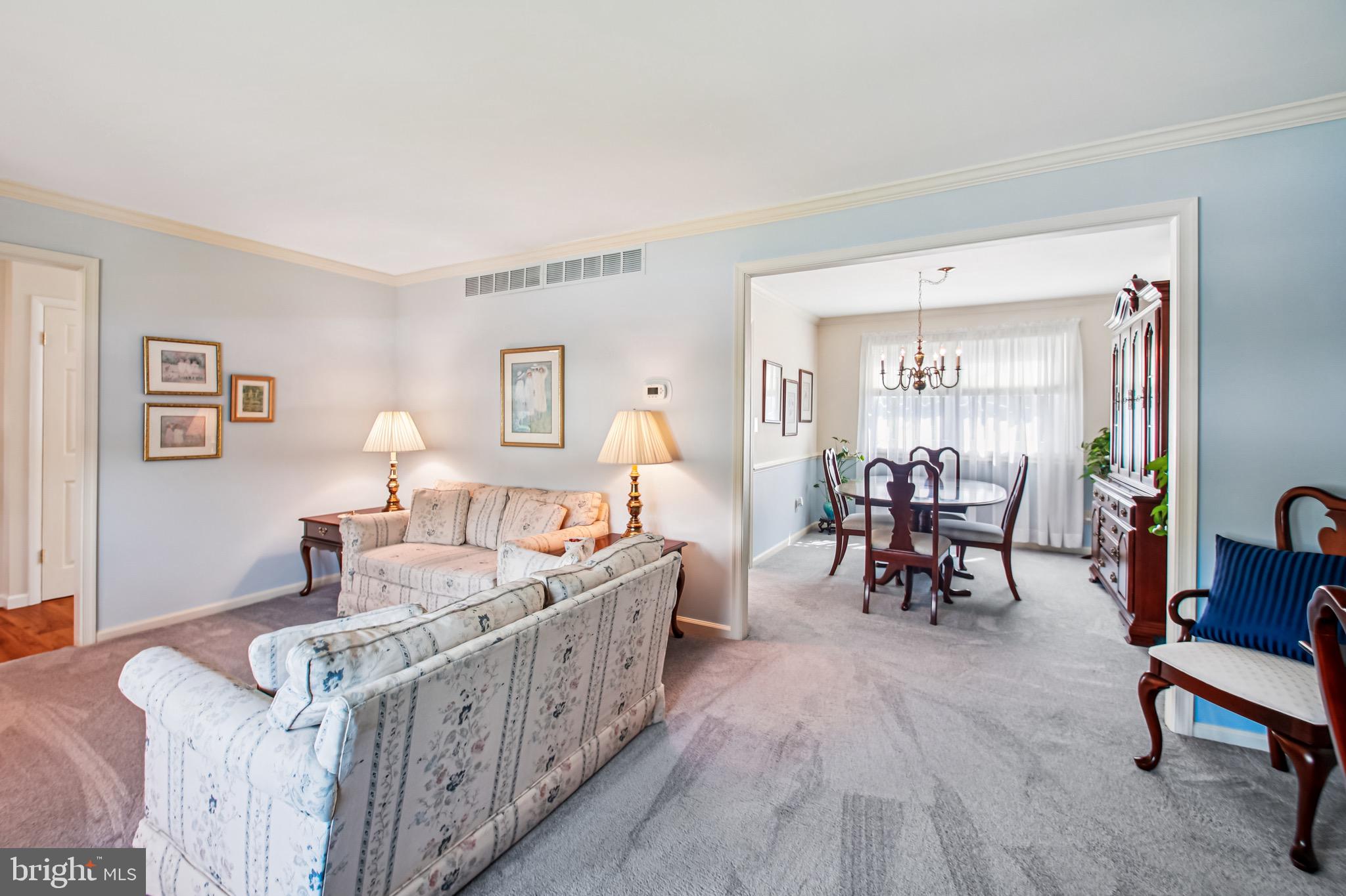 8113 Callo Lane Rosedale, MD 21237 - Photo 6 of 32 a living room with furniture and a wooden floor
