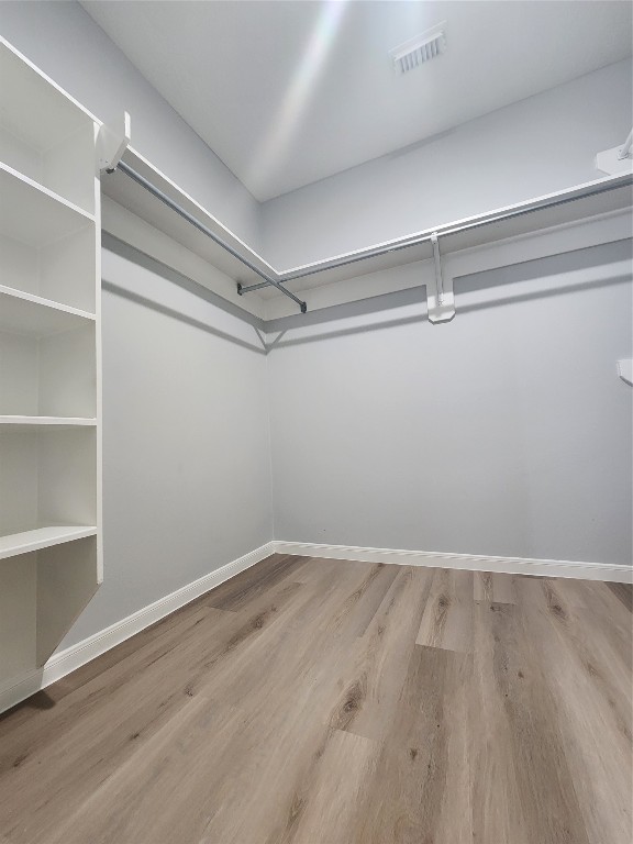 5507 Clarkston Lane Spring, TX 77379 - Photo 15 of 25 a view of a room with wooden floor