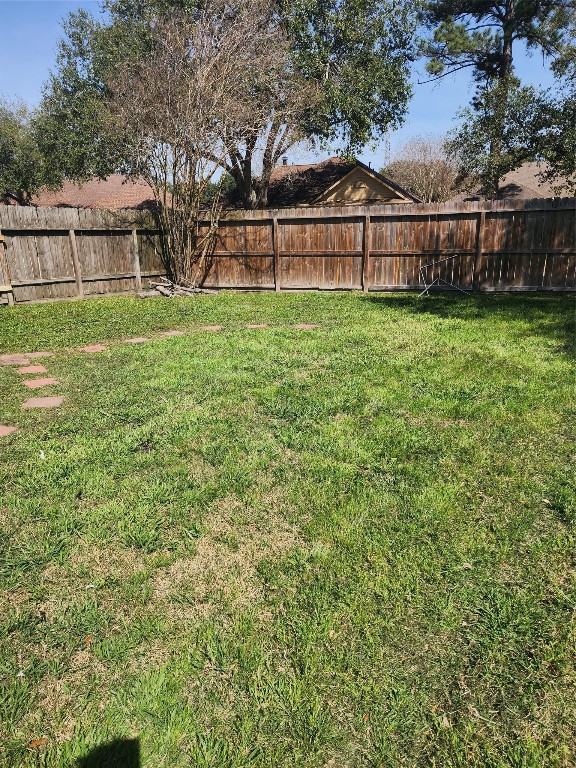 5507 Clarkston Lane Spring, TX 77379 - Photo 23 of 25 a view of a yard with large trees and fence