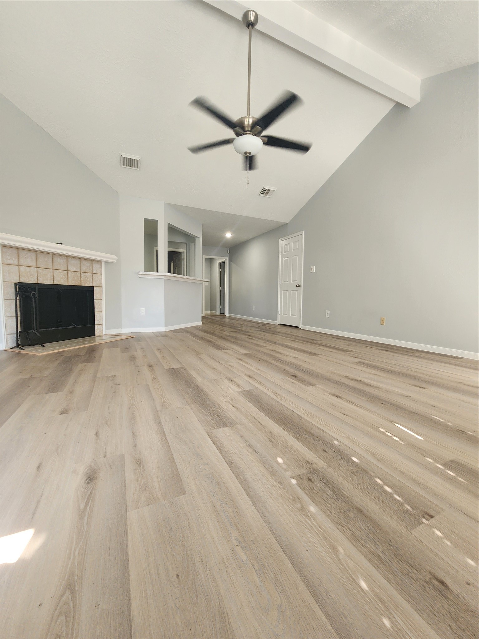 5507 Clarkston Lane Spring, TX 77379 - Photo 4 of 25 a view of empty room with wooden floor and fan