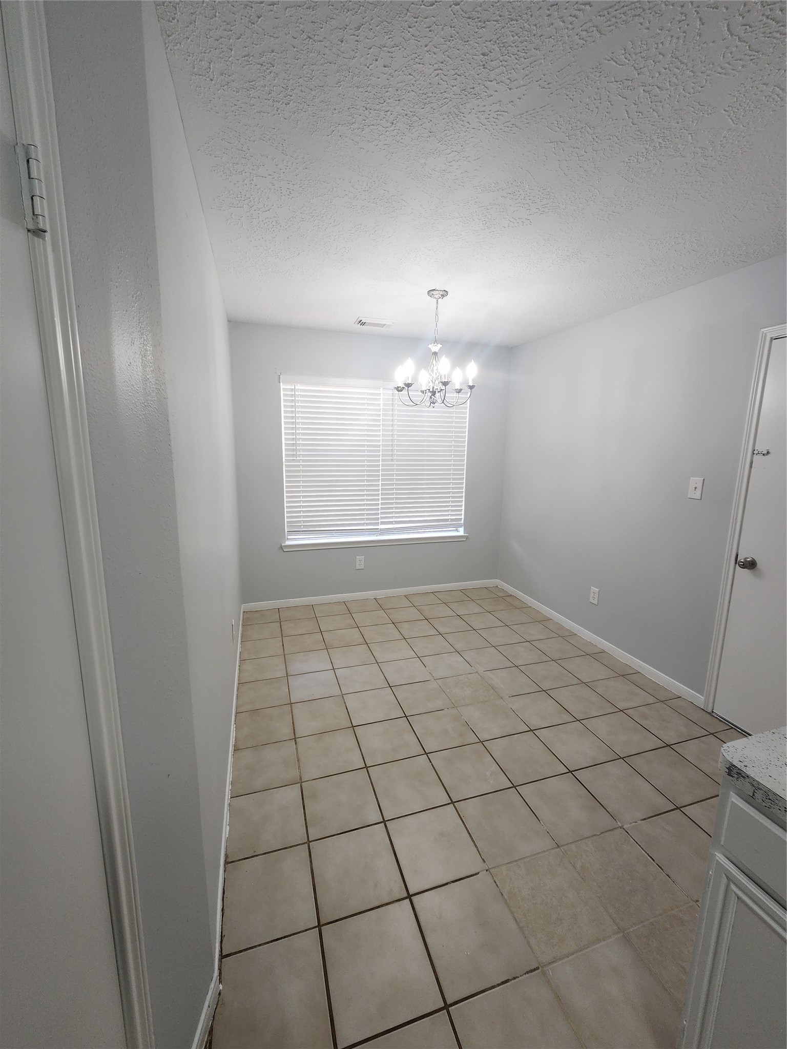 5507 Clarkston Lane Spring, TX 77379 - Photo 9 of 25 en empty room with windows
