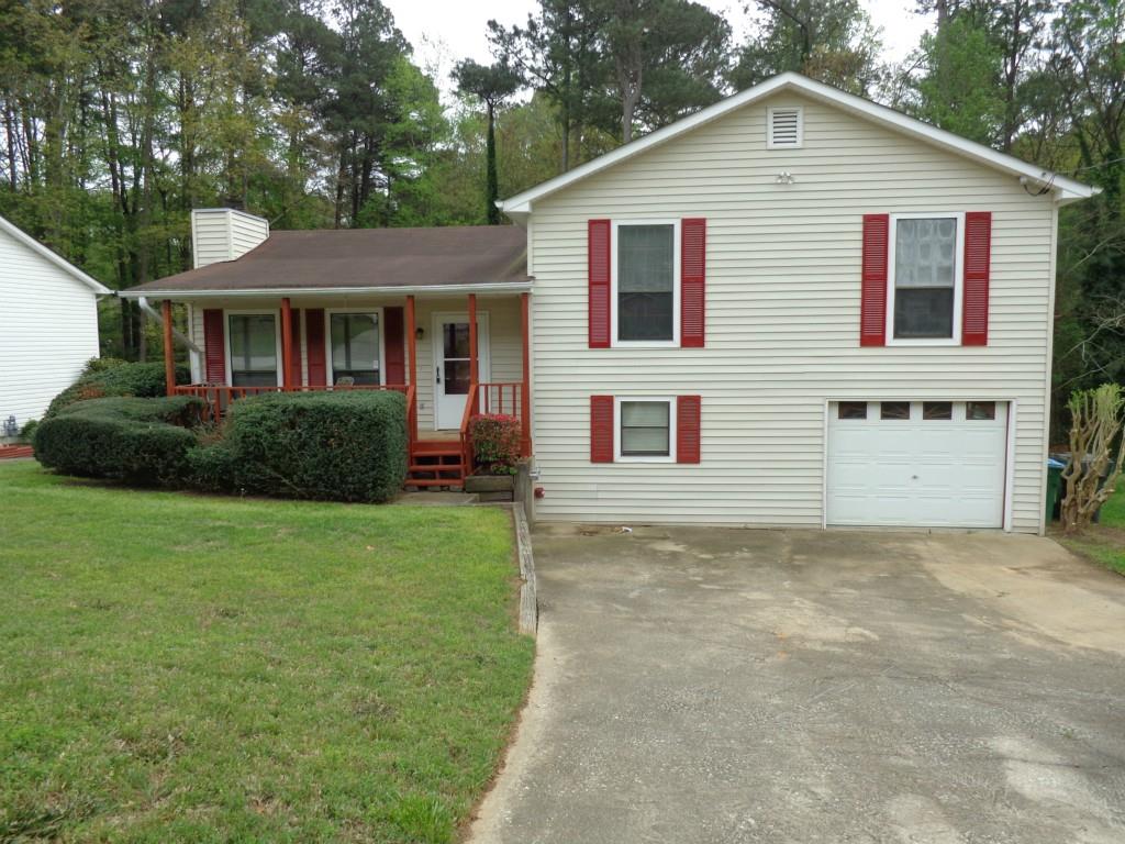3780 Ferncliff Road Southwest Snellville, GA 30039 - Photo 1 of 1 a view of a yard in front view of a house