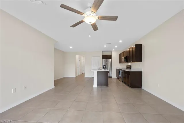 an aerial view of a city with lawn chairs