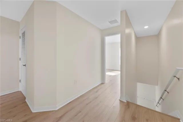 a kitchen with stainless steel appliances kitchen island granite countertop a sink and cabinets