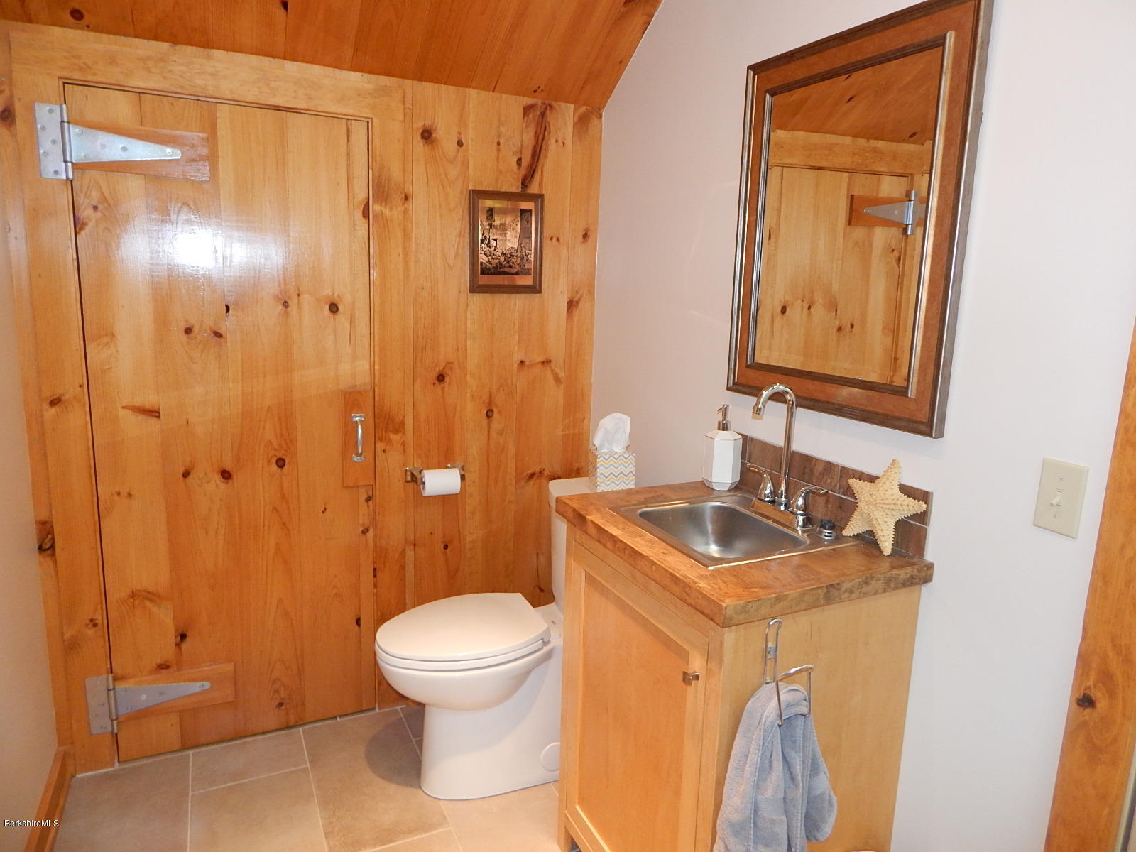 301 Frost Road Washington, MA 01223 - Photo 13 of 31 a bathroom with a sink a toilet and shower