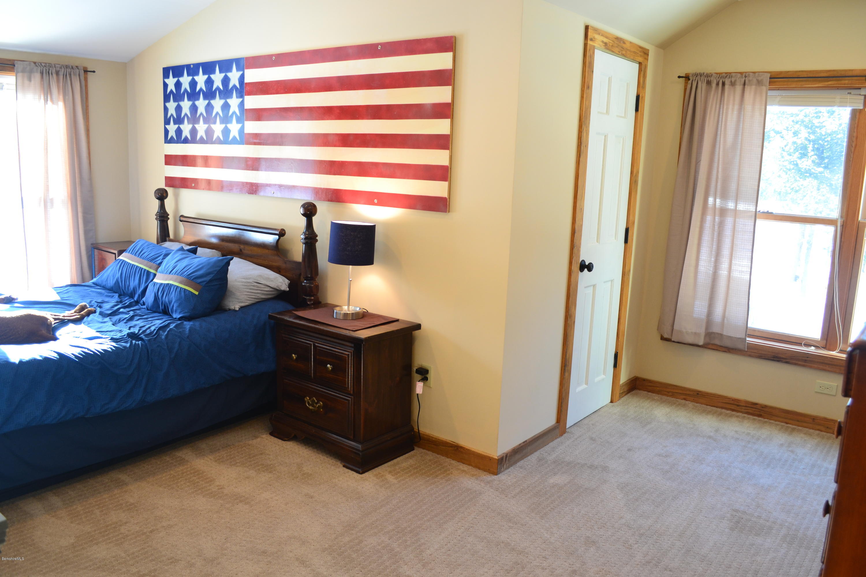 301 Frost Road Washington, MA 01223 - Photo 21 of 31 a bedroom with a bed and a window