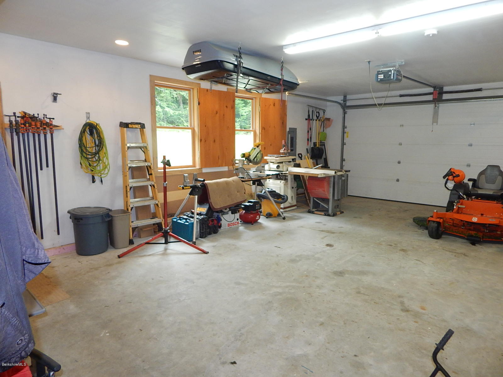 301 Frost Road Washington, MA 01223 - Photo 23 of 31 a view of a room with gym equipment and a large window