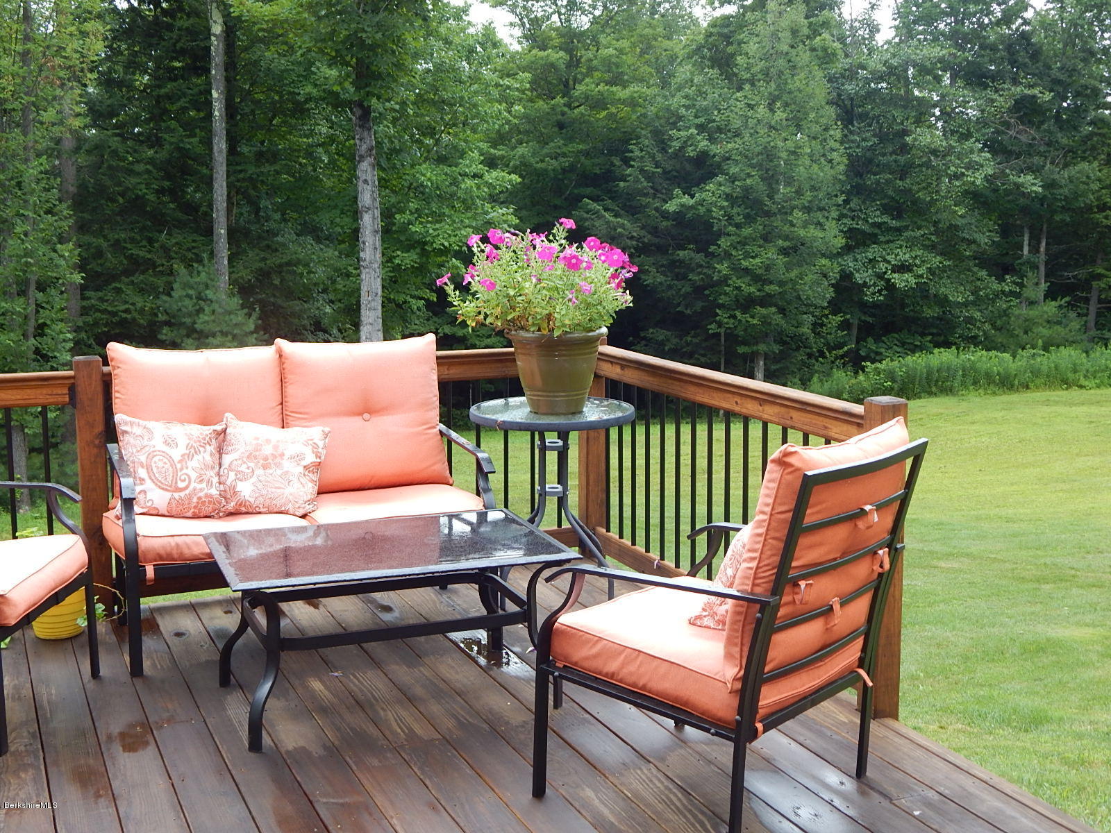 301 Frost Road Washington, MA 01223 - Photo 24 of 31 a roof deck with a table and chairs