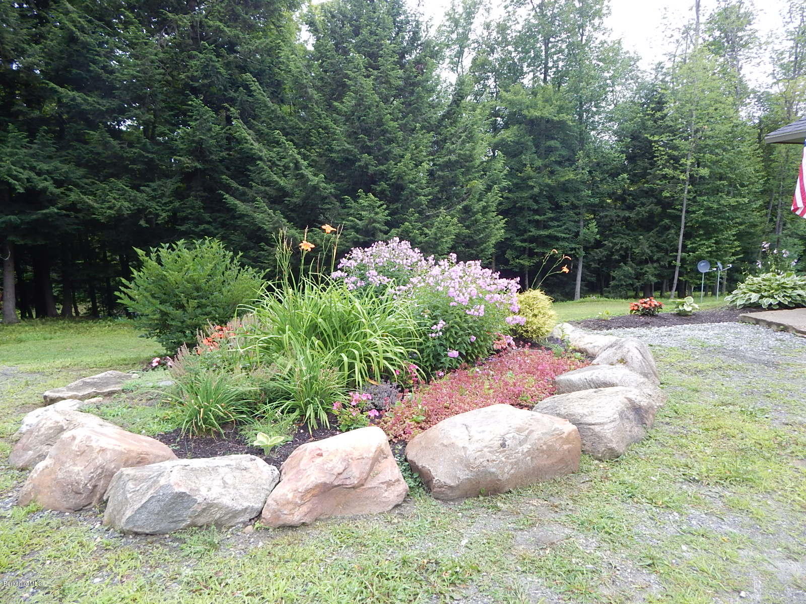301 Frost Road Washington, MA 01223 - Photo 25 of 31 a view of a garden with plants