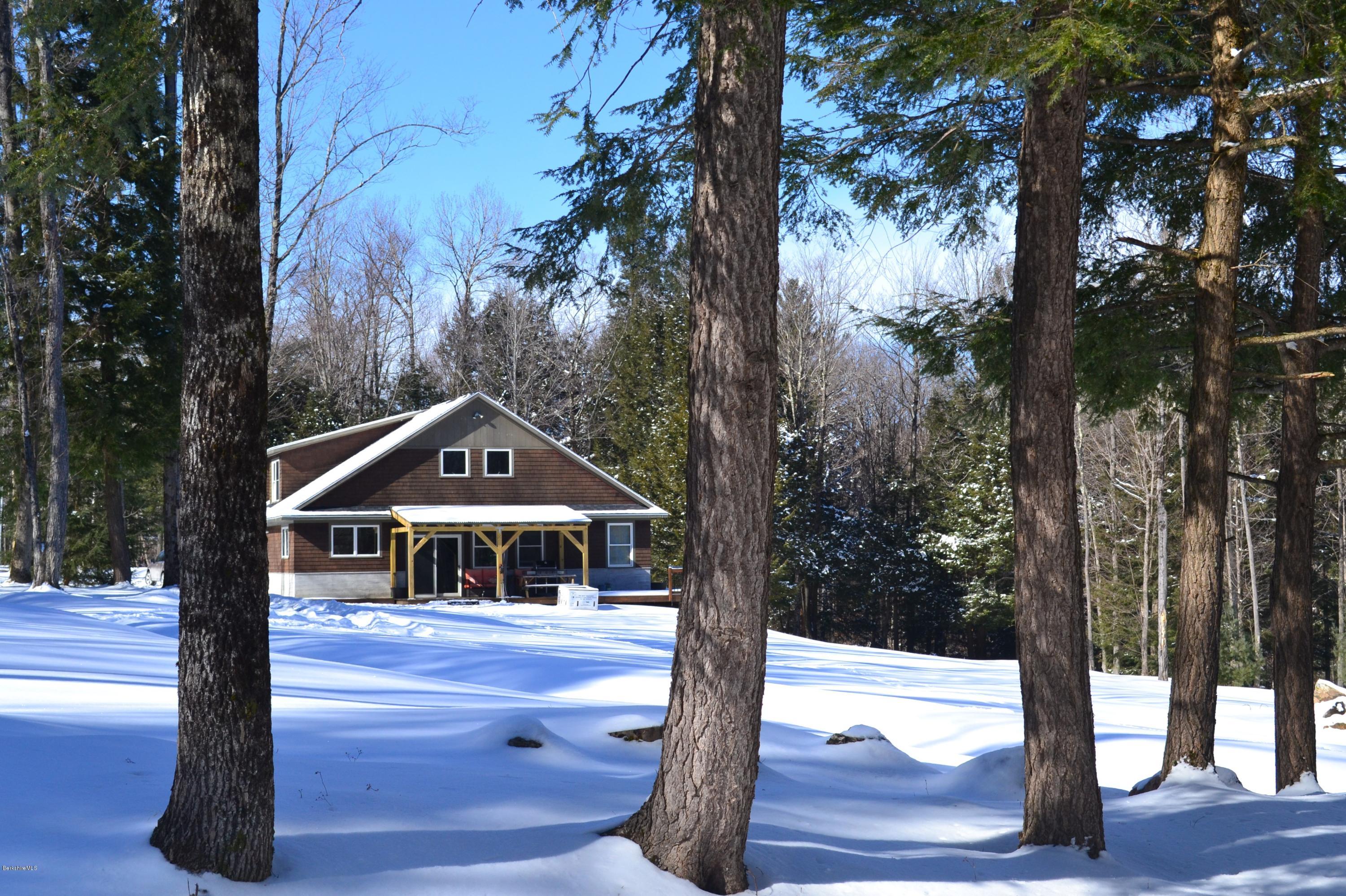 301 Frost Road Washington, MA 01223 - Photo 29 of 31 a house with trees in the background
