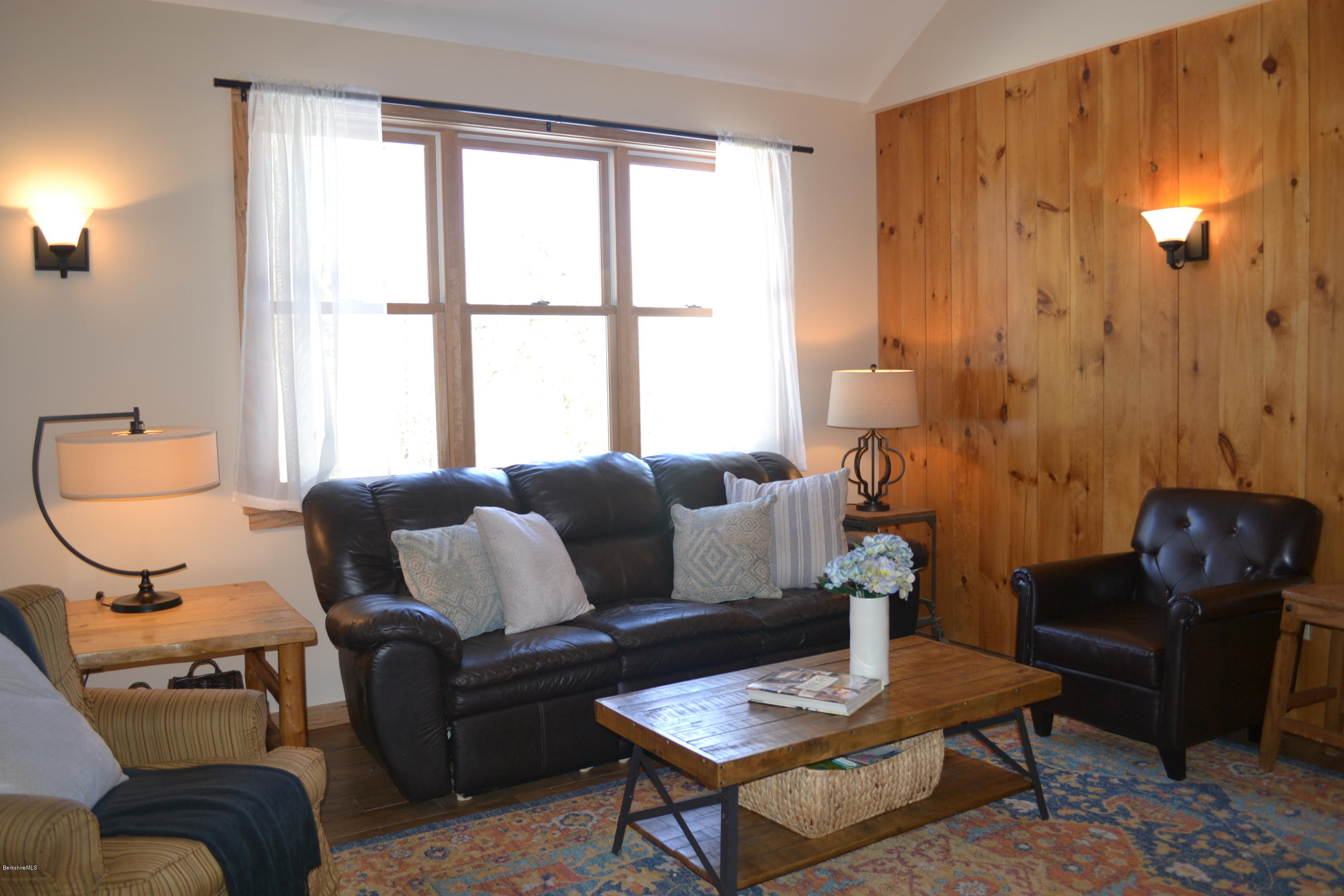 301 Frost Road Washington, MA 01223 - Photo 5 of 31 a living room with furniture a lamp and a window