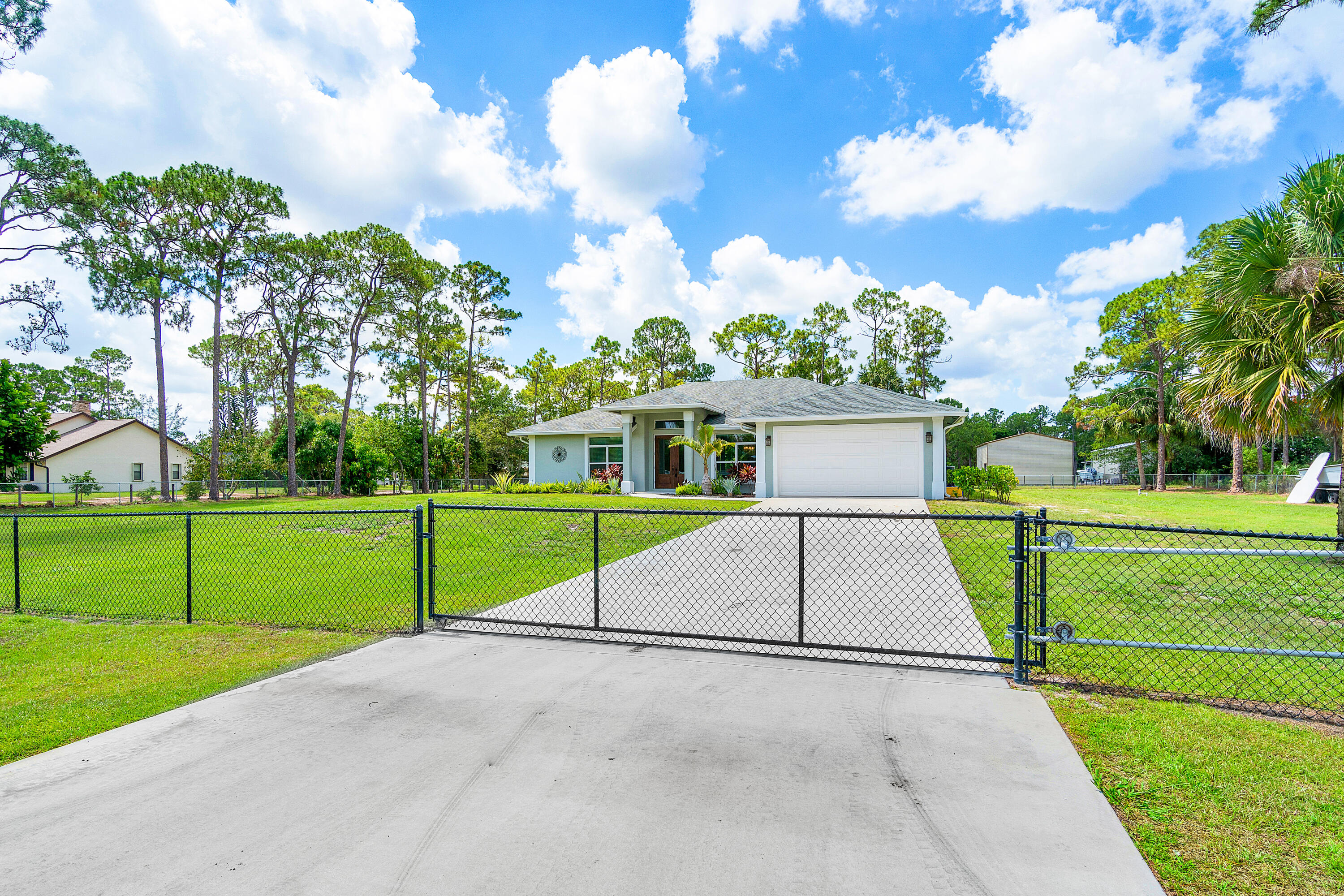 17106 88th Road North Loxahatchee, FL 33470 - Photo 1 of 29 Front House Gate