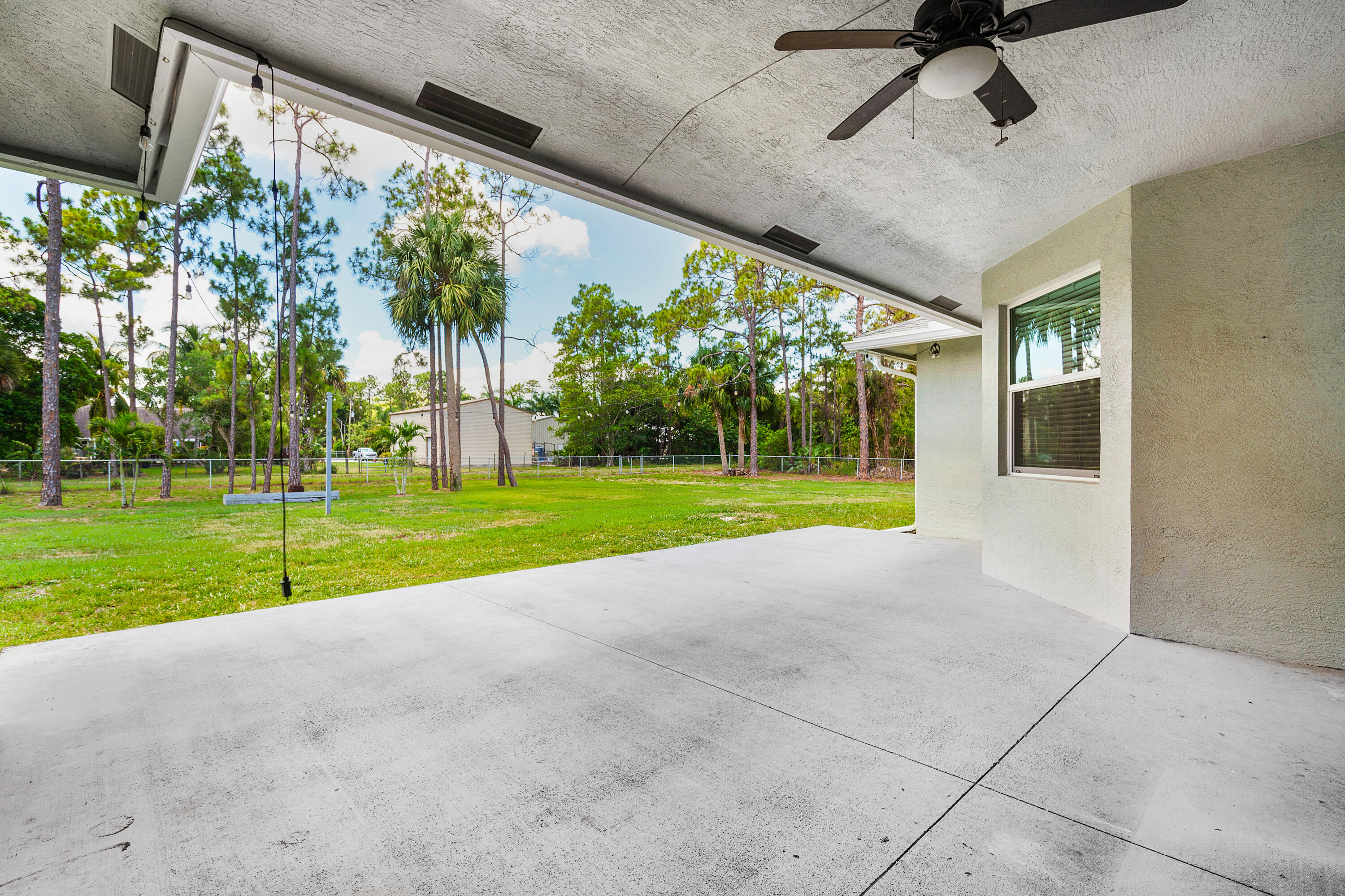 17106 88th Road North Loxahatchee, FL 33470 - Photo 23 of 29 Covered Patio