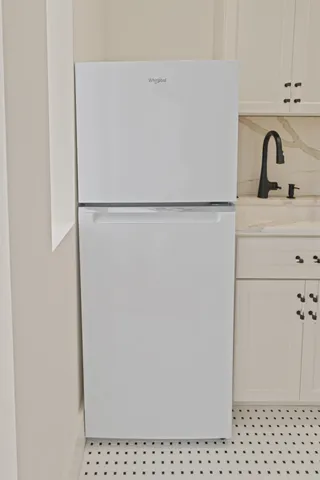 a balcony with chairs and with table