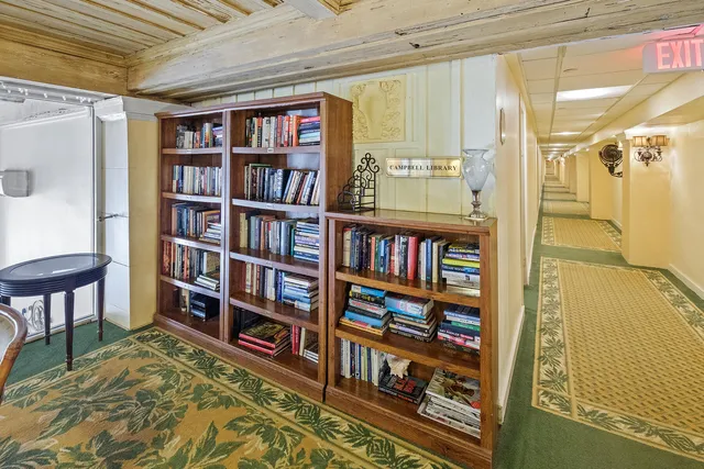 a view of a building with a yard