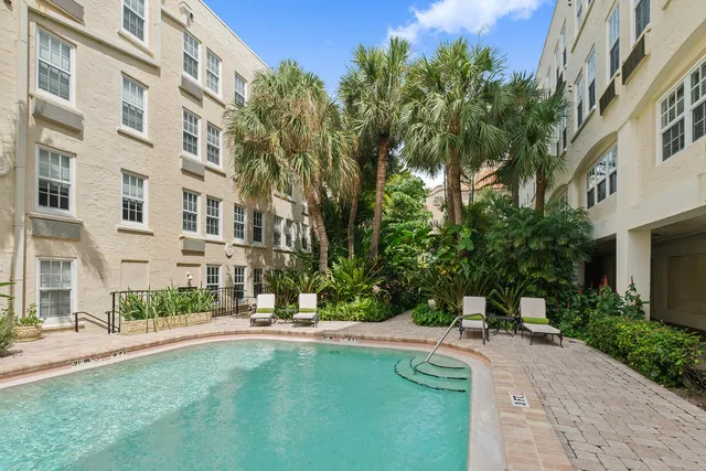 front view of a building with a yard