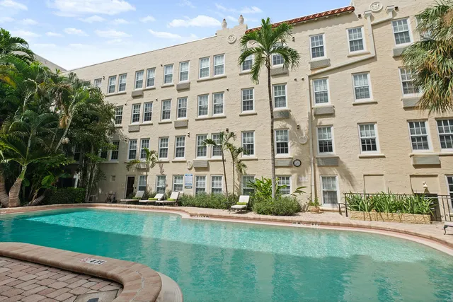 front view of a building with a yard