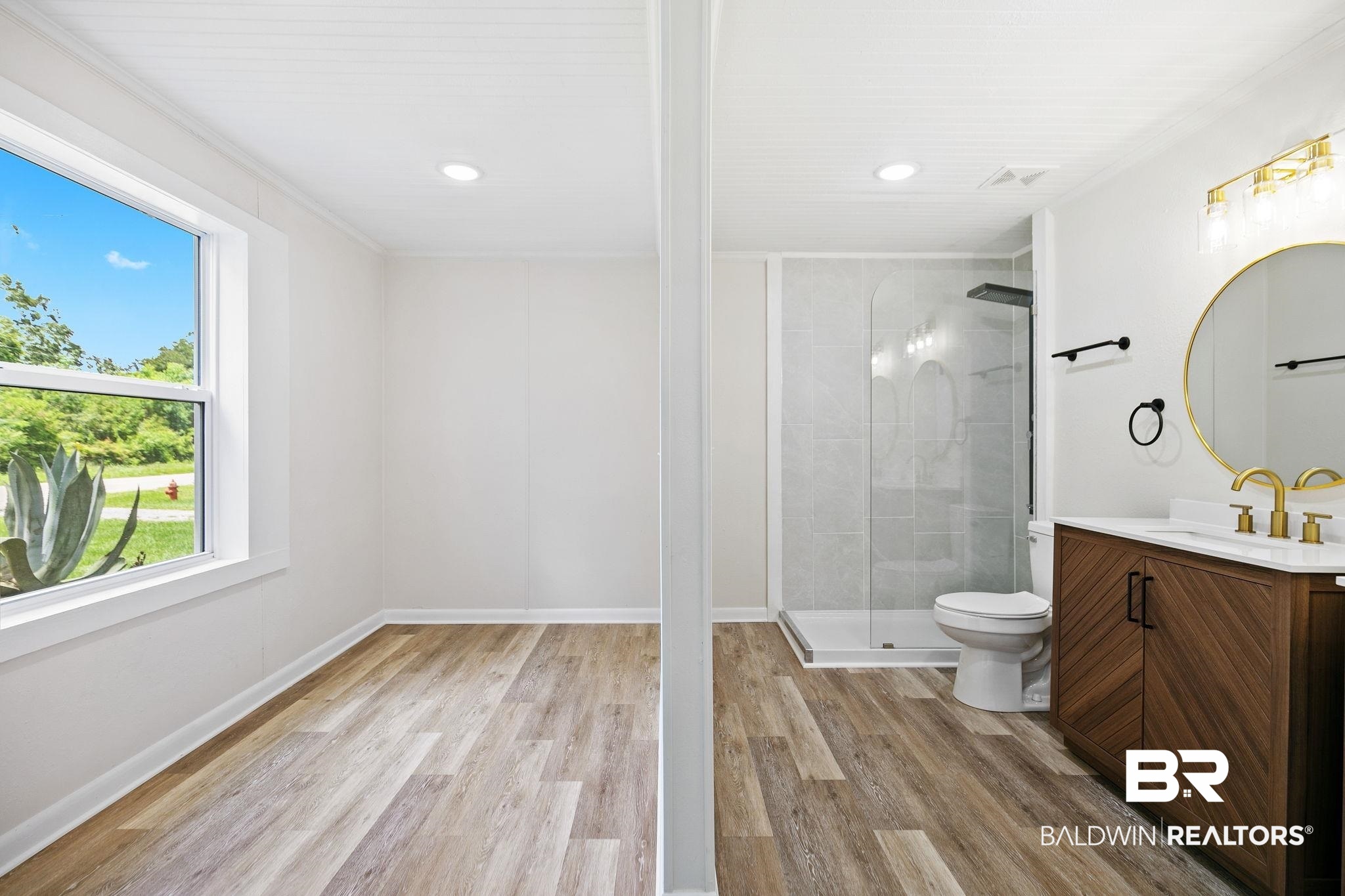 507 Byrne Street Bay Minette, AL 36507 - Photo 26 of 40 Bathroom with a shower with door, crown molding, toilet, vanity, and hardwood / wood-style flooring