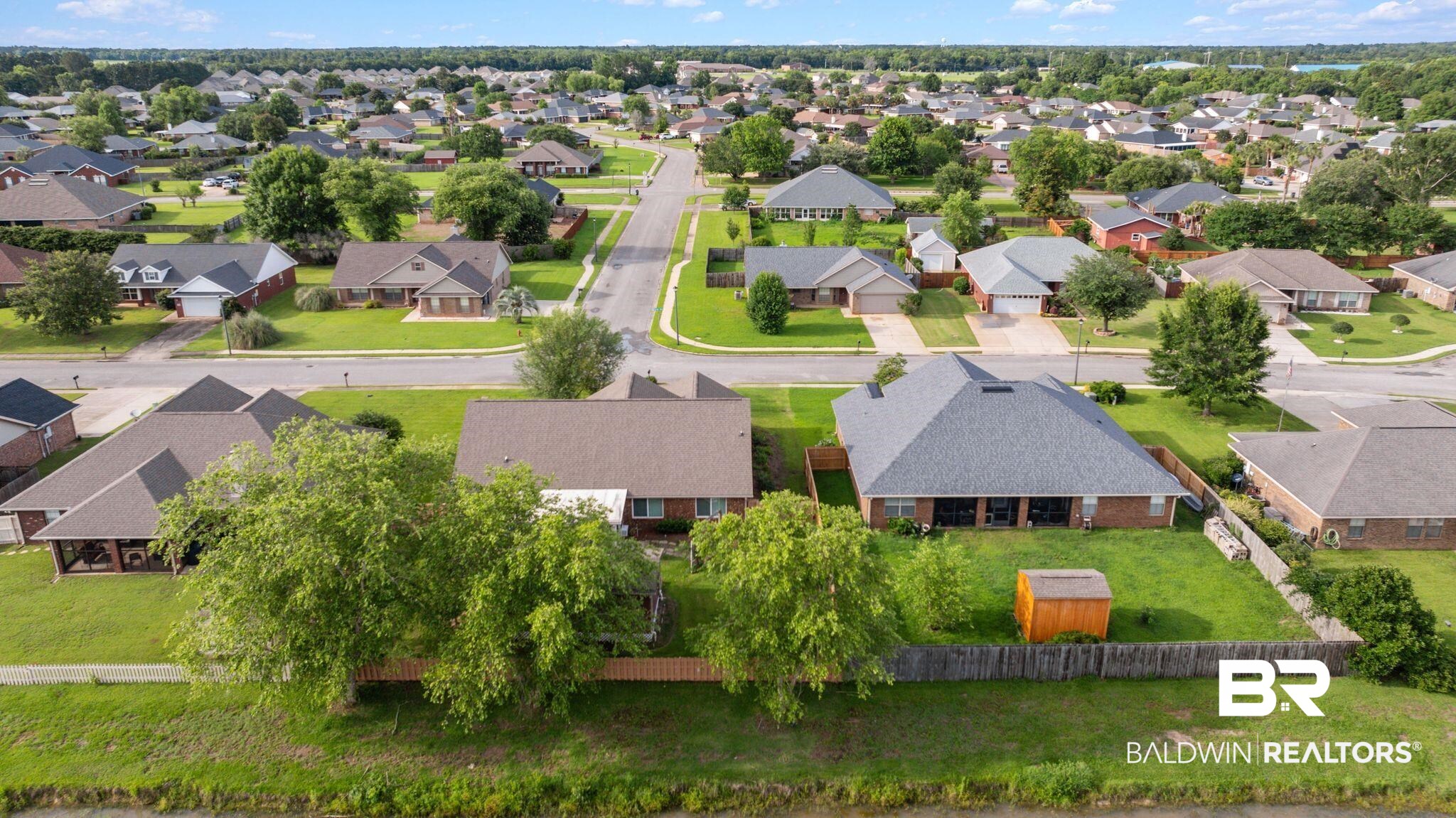 562 Vestige Mews Foley, AL 36535 - Photo 50 of 54 Residential neighborhood featuring detached single-family homes with pitched roofs